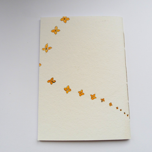 Fleurs de brocoli illustrées sur couverture en papier fait à la main